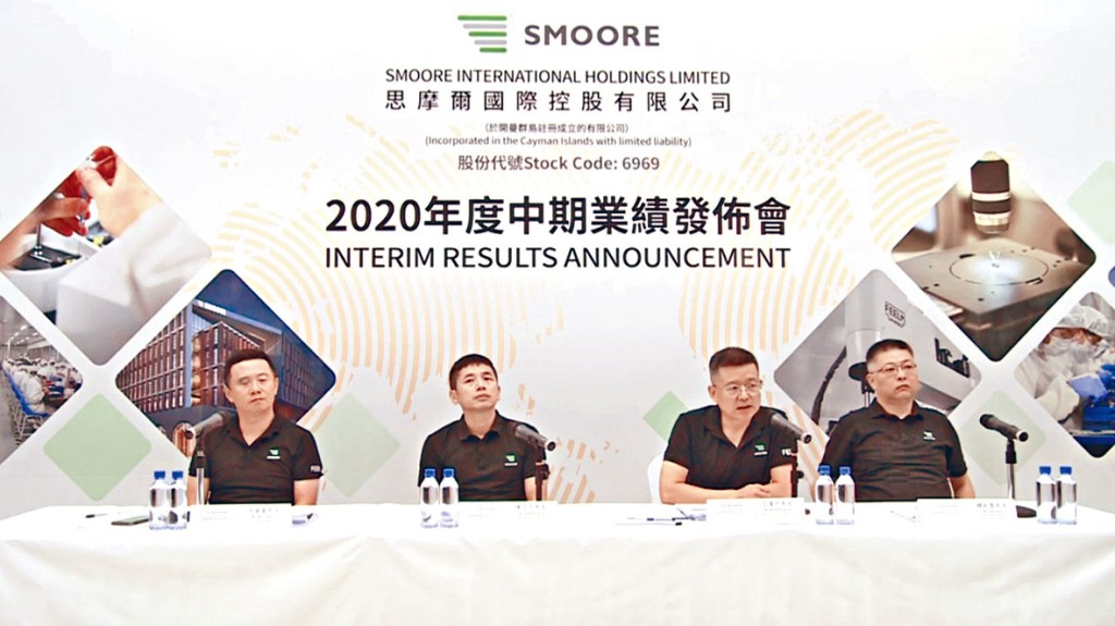 陈志平(左二)表示，思摩尔未来将拓展雾化技术在医疗健康领域的应用。