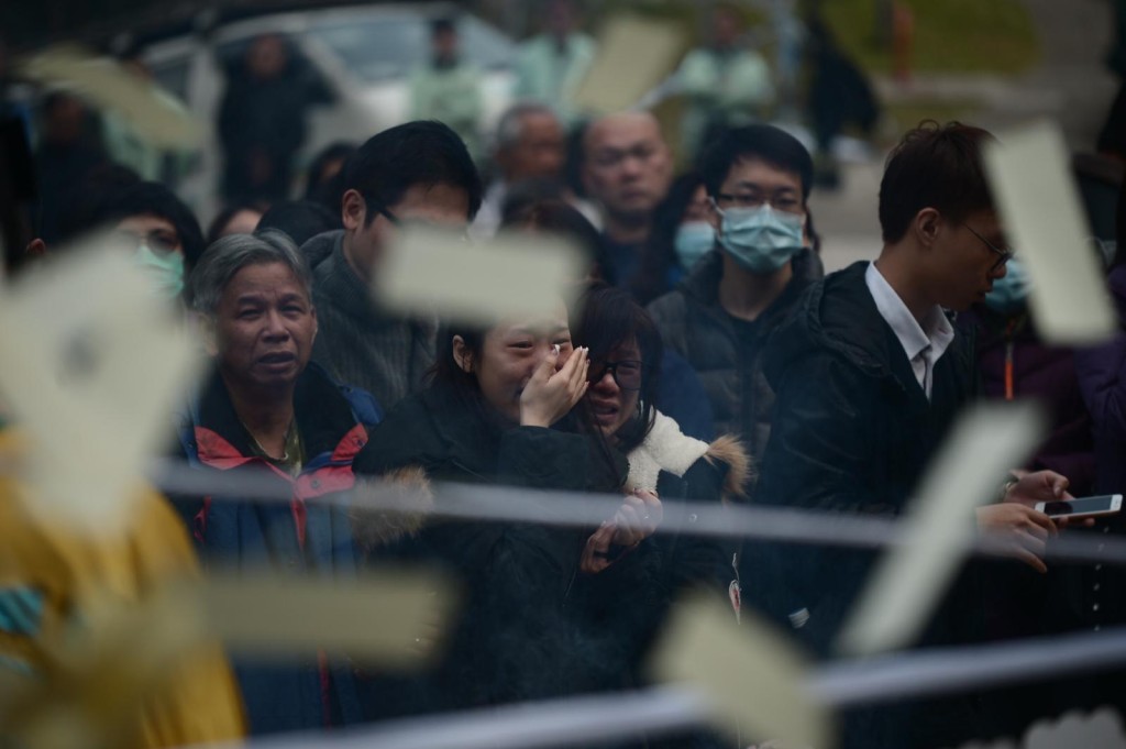 家屬痛哭。蘇正謙攝