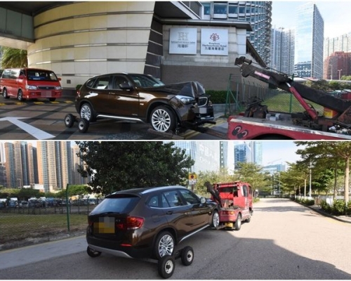 肇事私家車車頭V形凹陷,被拖車拖走。