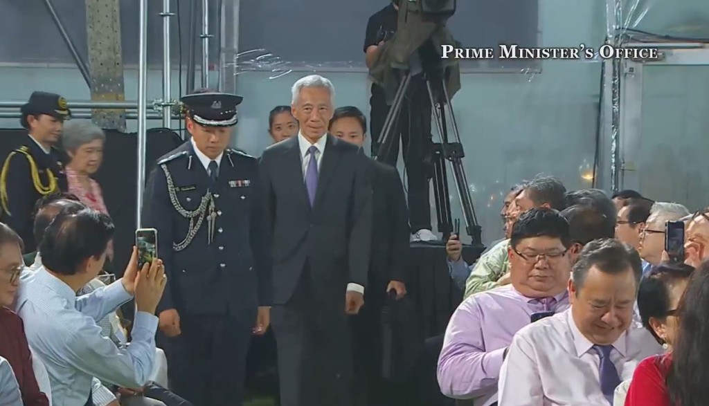 李显龙出席新总理黄循财的就职典礼。