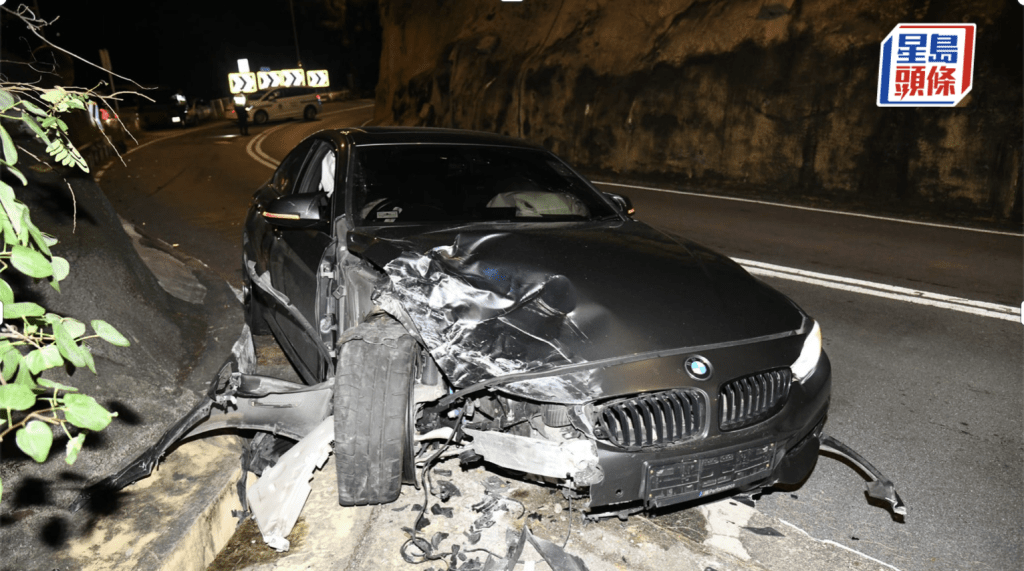 寶馬私家車車頭損毀嚴重。李家傑攝