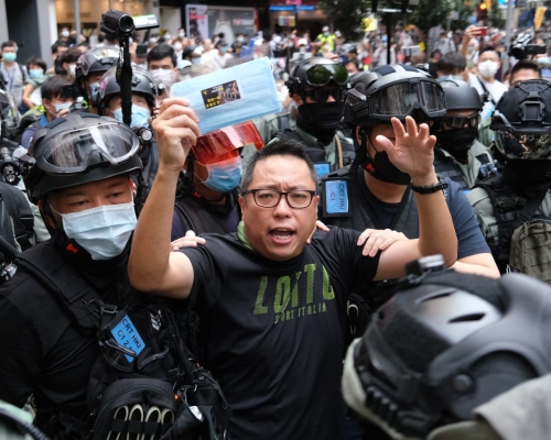 譚得志被捕。
