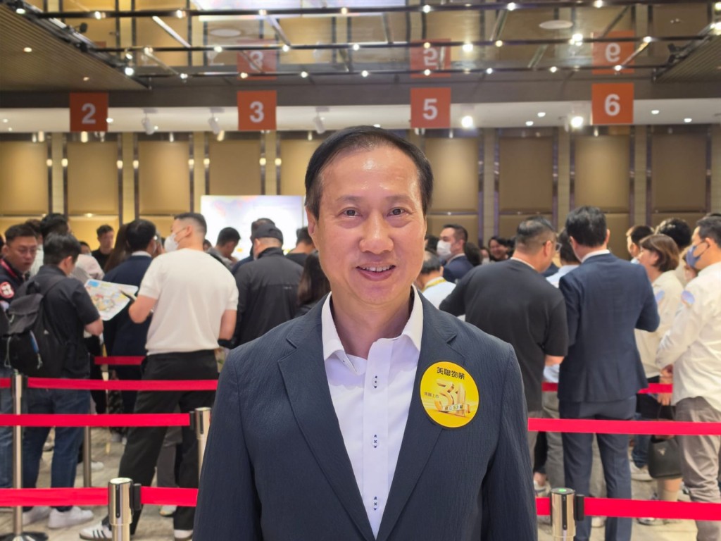 美联高级董事布少明。