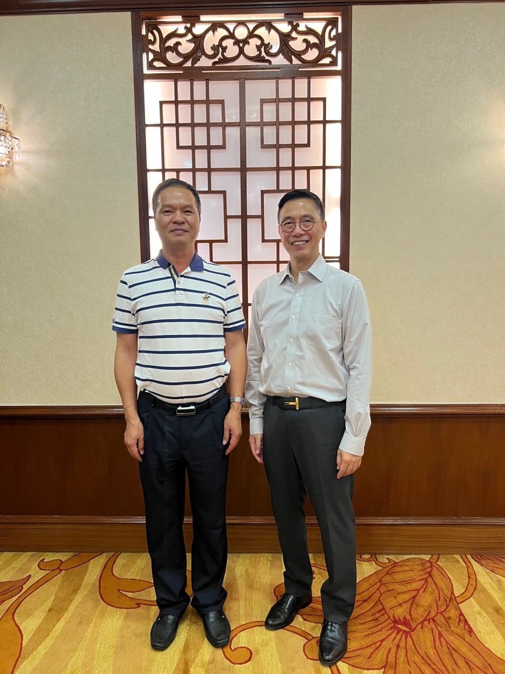 楊潤雄(右)與佛山市人民政府副市長黃少文(左)見面。政府新聞處圖片