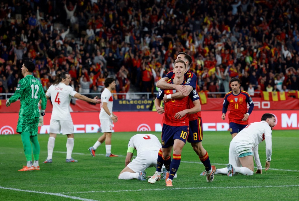 西班牙2：2賽和土耳其，全勝不失球金身被破。路透社