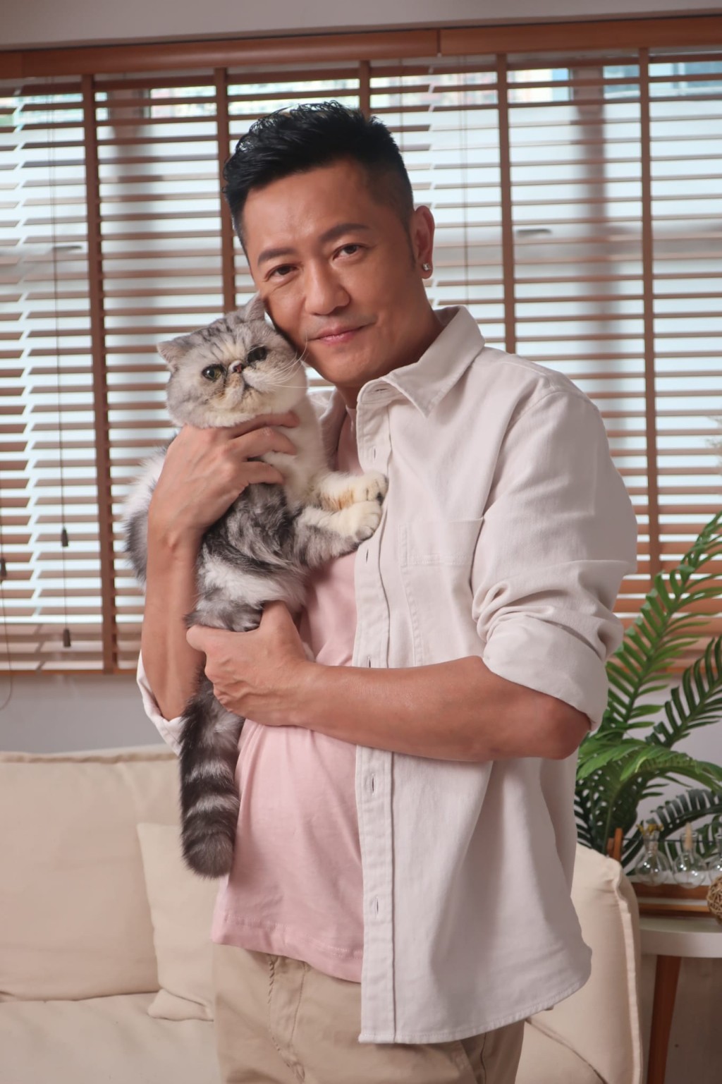 蘇志威與寵物「豹豹」。