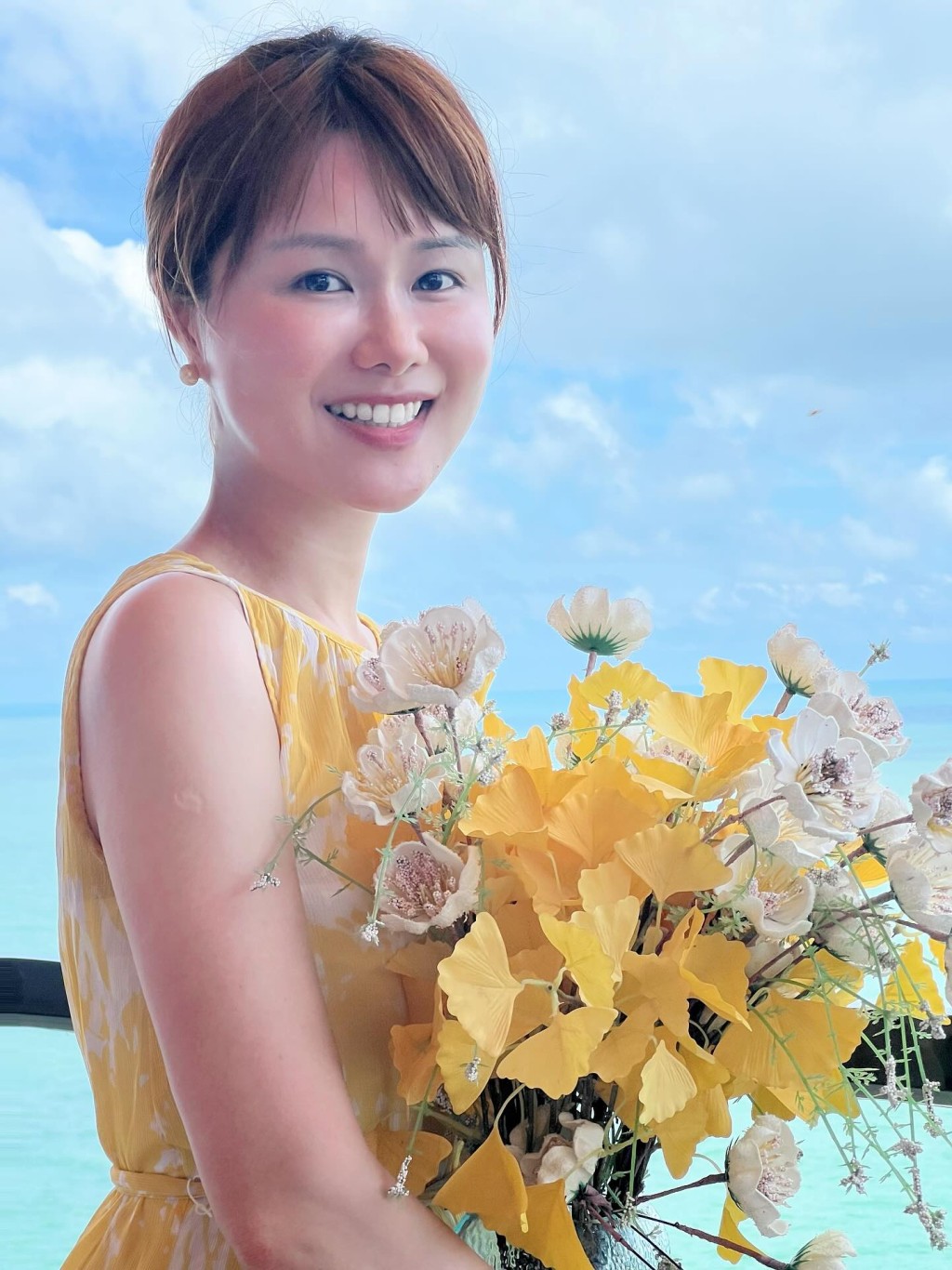 劉思希有花收。