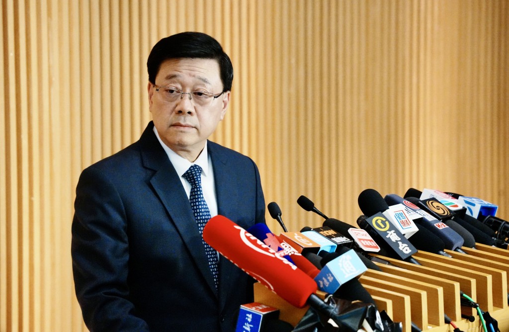 李家超強調,政府以「先驅性」方式成立獨立委員會,工作將分為兩大部分。汪旭峰攝 李家超強調,政府以「先驅性」方式成立獨立委員會,工作將分為兩大部分。汪旭峰攝