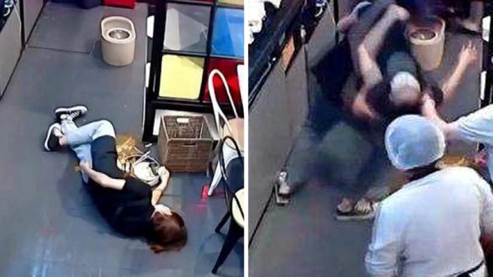 四川成都一餐廳女職員不慎滑倒，男同事協助時一再滑倒。網上圖片