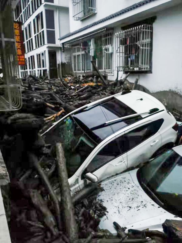 強降雨單在阿壩已導致7人死亡24人失蹤。新華社