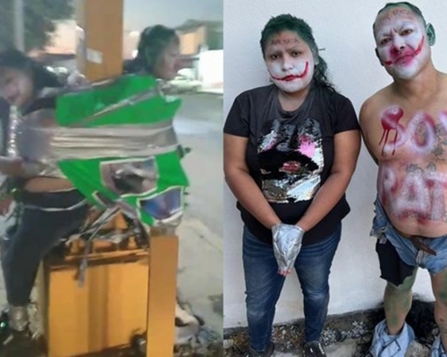 墨西哥一對男女賊人疑遭人私刑，臉被塗成小丑模樣並用膠紙綁在燈柱上。網圖