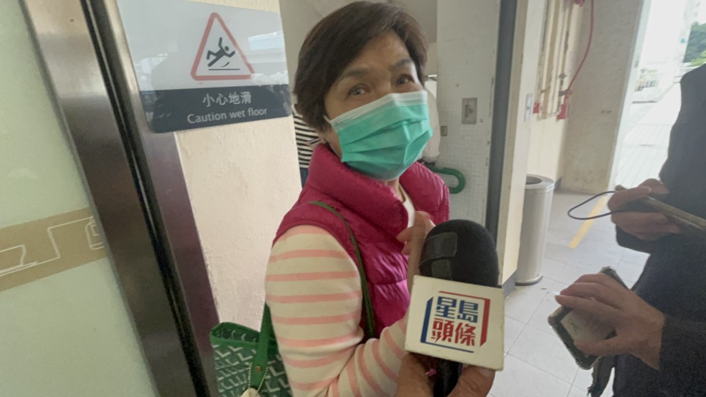 宏志閣居民林女士對於能逃生感幸運，直言「錢財身外物」。楊偉亨攝