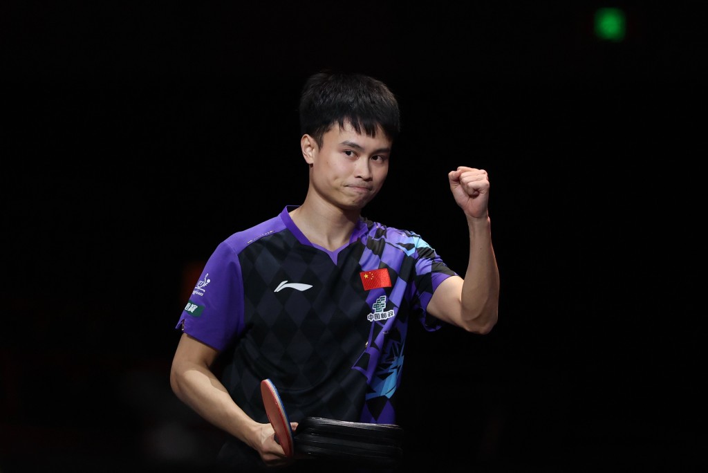 周啟豪3:0掃走張本智和。中新社 周啟豪3:0掃走張本智和。中新社