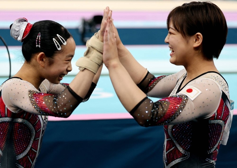 日本女子體操隊成員在宮田笙子被遣返日本後，仍能取得團體賽決賽資格。路透社