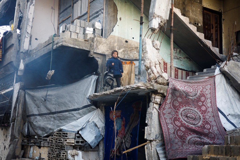 加沙北部再遭空襲，樓房遭炸毀。路透社