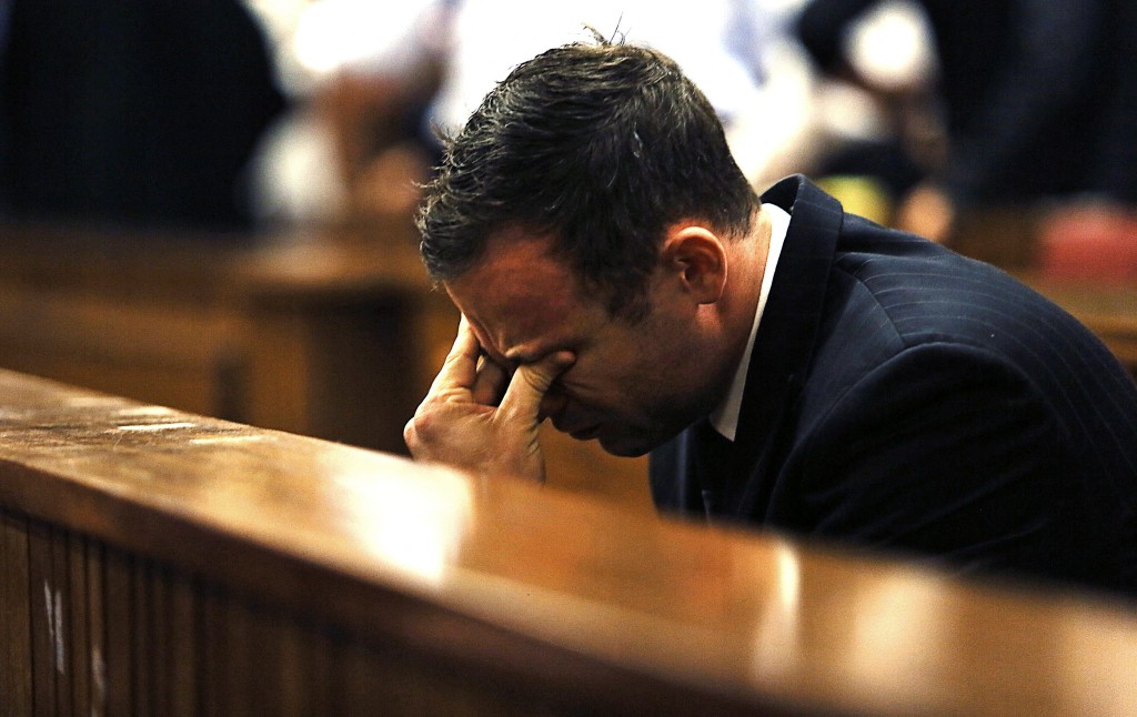2014年9月12日，皮斯托留斯（Oscar Pistorius）掩面听取法官裁决。 路透社