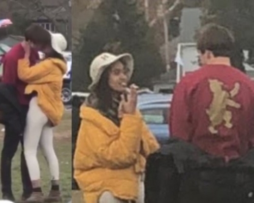 足球賽事上瑪利亞和一名英俊的青年擁吻。網圖