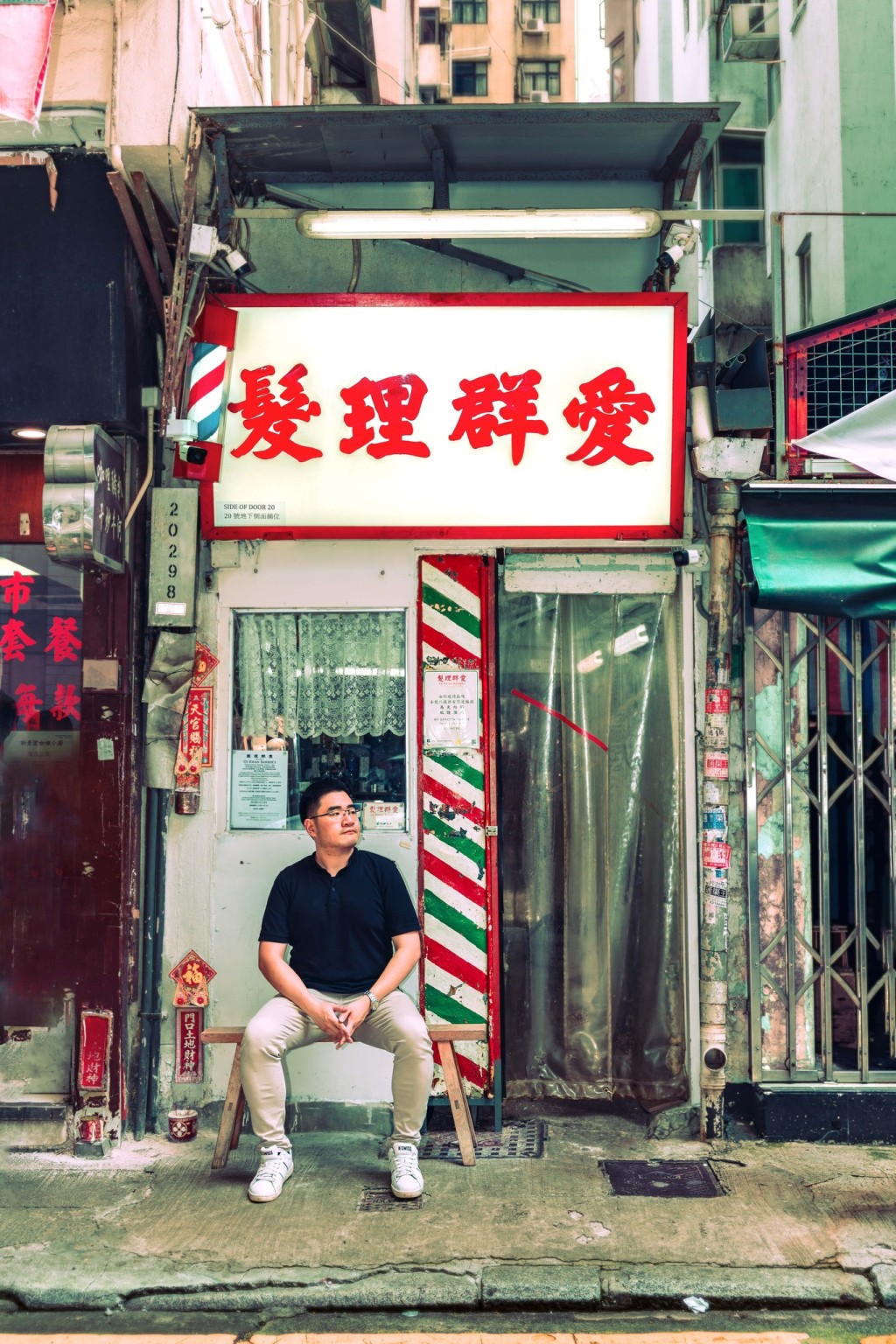 灣仔愛群理髮店在1962起開業，至今由90後當家Mark接手經營。(Discover Hong Kong)