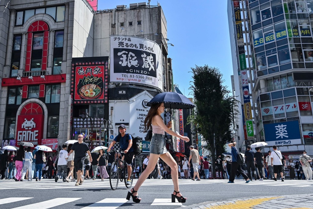 全日本已有36個都府縣發布中暑警戒警報。法新社 全日本已有36個都府縣發布中暑警戒警報。法新社