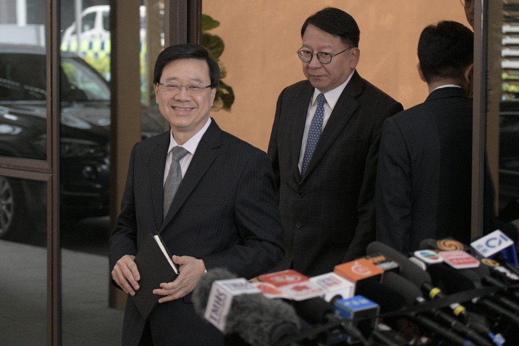 李家超指香港和重慶同意在11個領域共同合作發展。陳浩元攝
