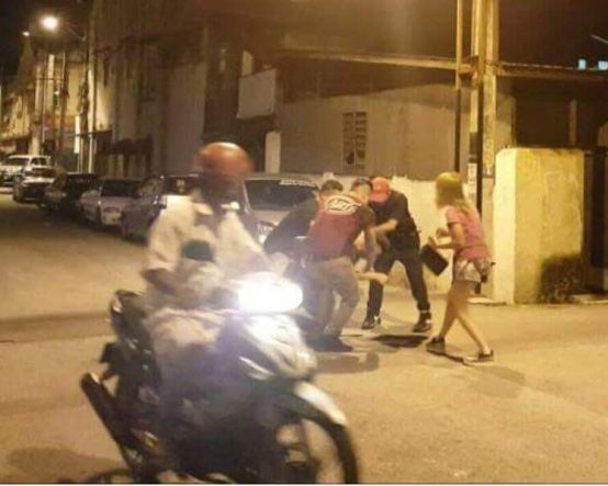 之後網上流傳3人合力捉一男子,林雅詩就拿回手袋的照片。(網上圖片)