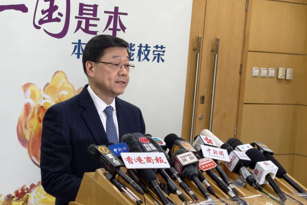 李家超回應提問。駐京記者楊浚源攝