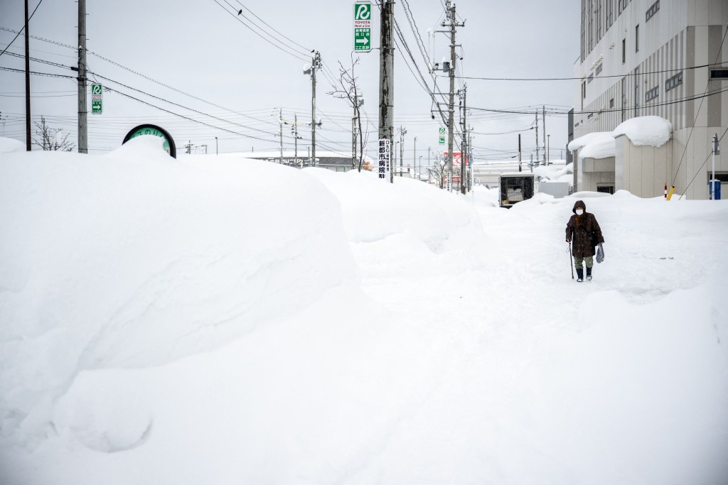 日本多地积雪破纪录。法新社