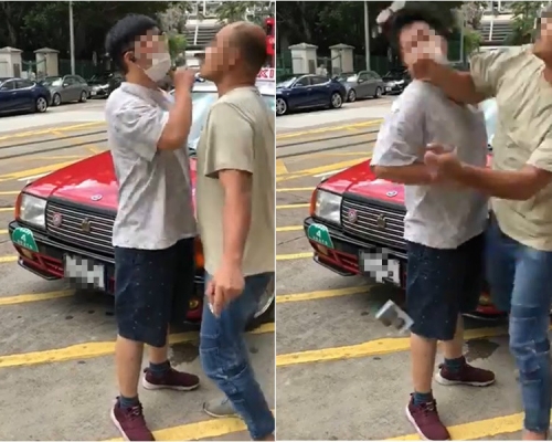 的士司機與男子發生肢體碰撞後，男子揮拳打向司機。影片截圖
