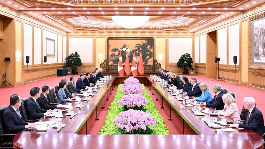 國家主席習近平同加拿大總理卡尼會晤。 新華社