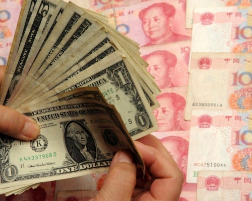 人行宣布上調遠期售滙業務外滙風險準備金率為20%。新華社資料圖片