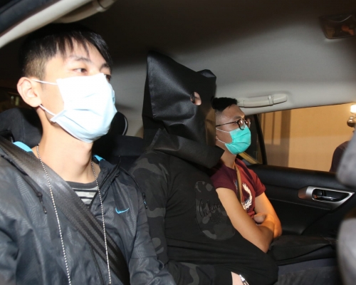 被捕疑犯帶返警署調查。