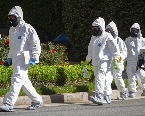 研究指新冠病毒可存於患者四米外物件。AP