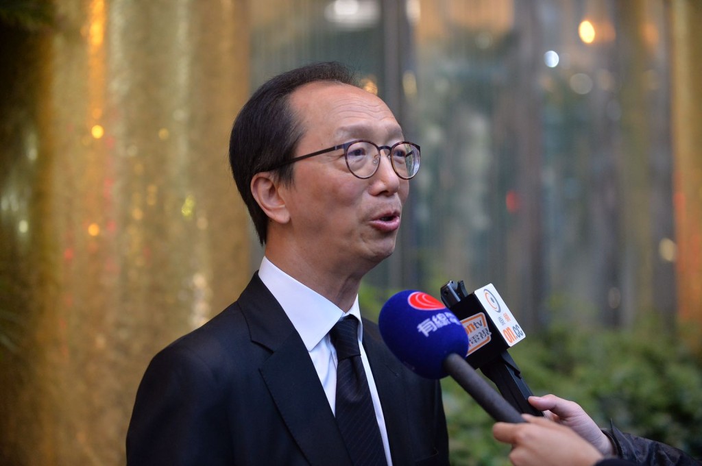 前財政司司長梁錦松。