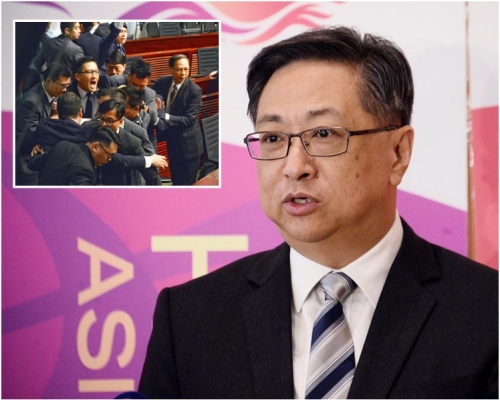 盧偉聰指案件已進入司法程序,他不便透露細節。小圖是林卓廷當時高呼口號。資料圖片