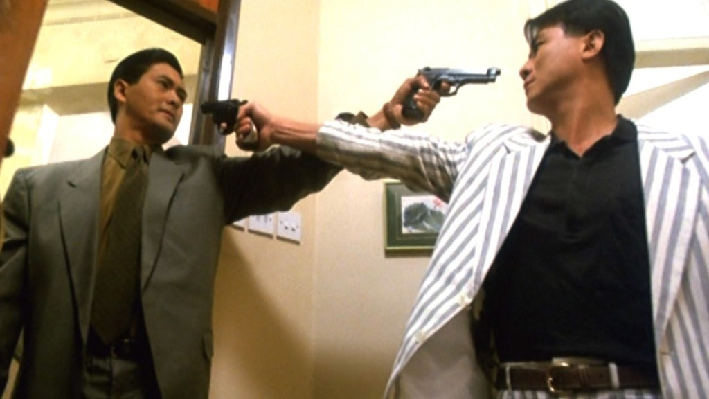 李修賢在《喋血雙雄》演警察，周潤發則演匪徒。