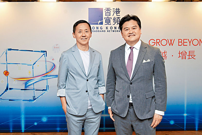楊主光(左)表示,未來或會擴大招聘成本,聘請新員工。