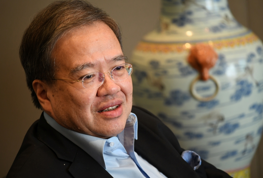 華昇診斷中心董事長胡定旭認為，大規模檢測是最有效切斷社區傳播鏈的方法。黃頌偉攝