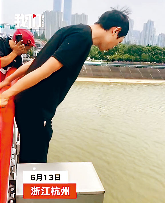 美團外賣員彭清林跳江救人。