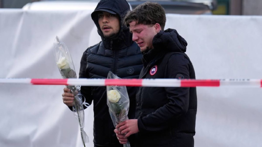 親人朋友悲痛欲絕。美聯社