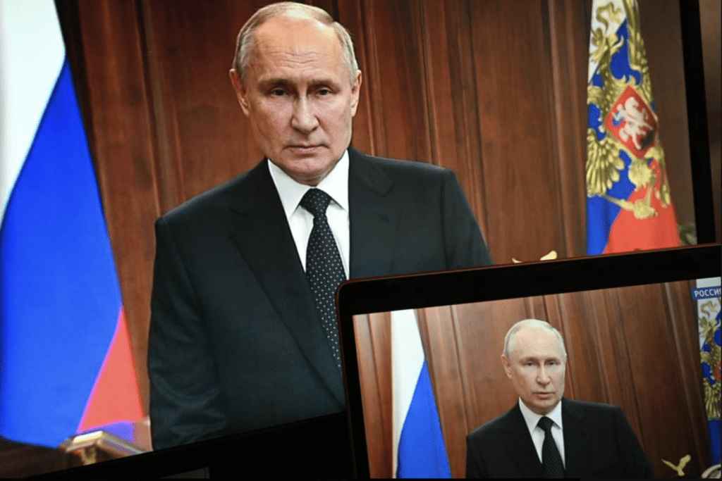 俄羅斯總統普京在電視上向全國發表講話。美聯社