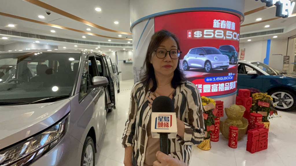 市民苏小姐认为更换电动车是未来大趋势。曾志恒摄