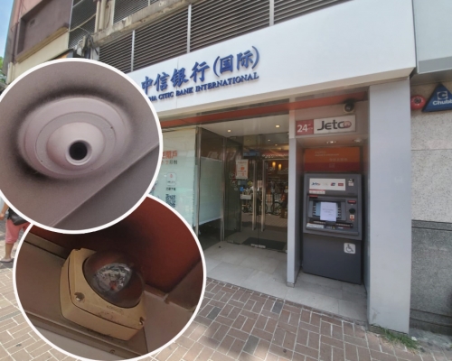 中信銀行2個閉路電視鏡頭遭人噴上黑色漆油。 林思明攝