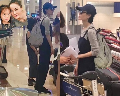 深色工人裤装、同款波鞋，王菲与李嫣母女装出巡好有爱。（网上图片）