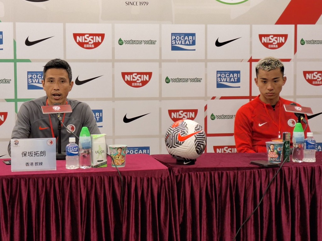 香港教练保坂拓朗（左）及李毅凯。