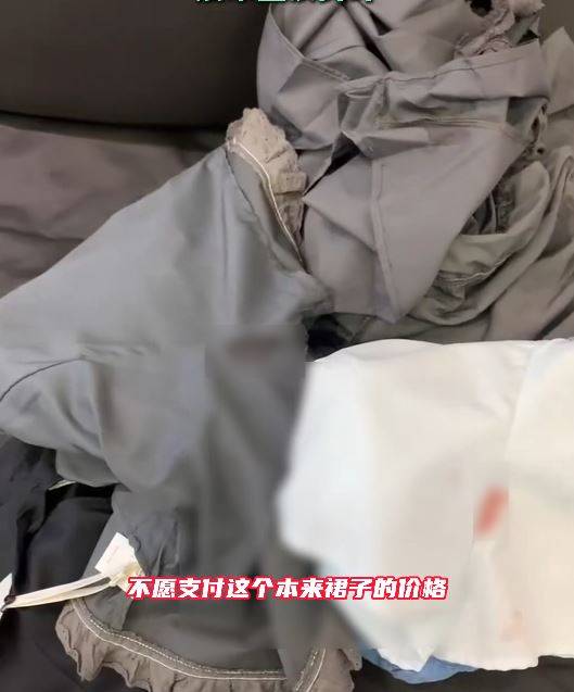 涉弄污裙子的女客反告店主侵犯私隱。抖音@微胖小眾女裝.南北