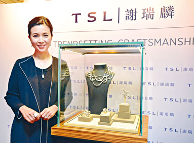 ■谢瑞麟主席谢邱安仪。