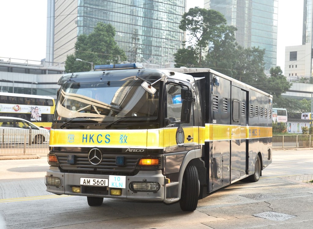 周向榮及陳冠忠今在高院判刑。