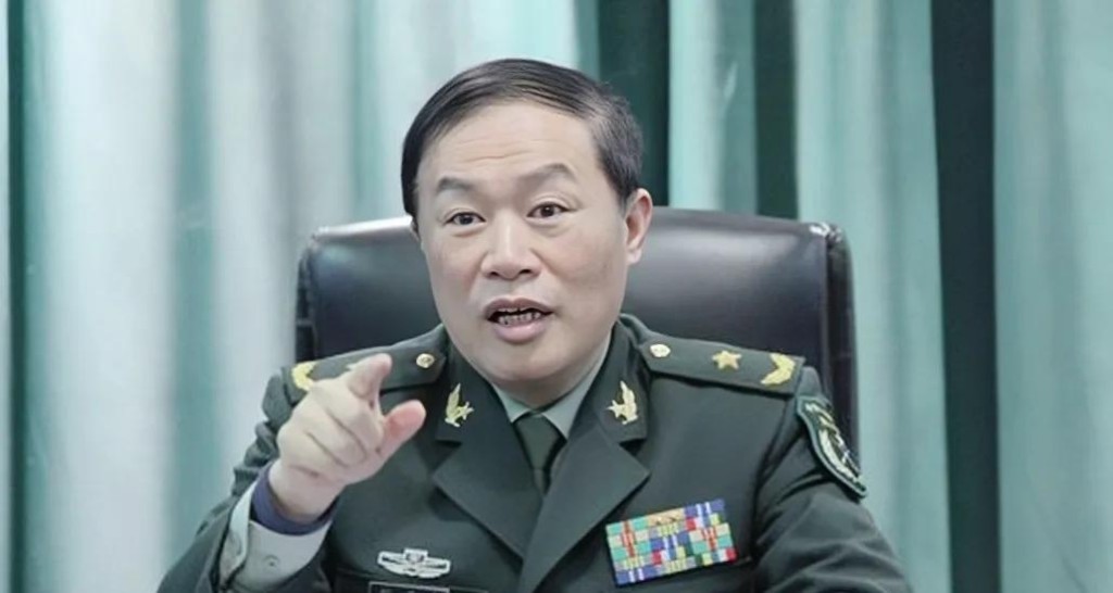 何衛東。
