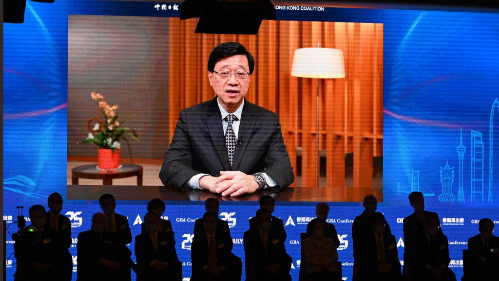李家超指香港與其他大灣區城市能夠緊密合作，一起共創新篇章。 