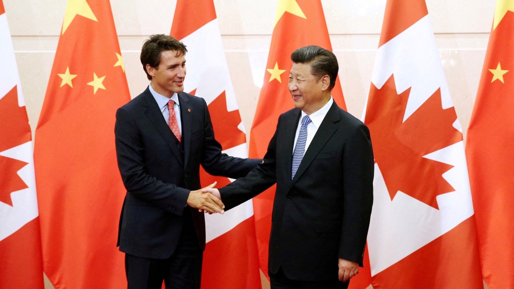 國家主席習近平與加拿大總理杜魯多2016年在北京會面。 路透社